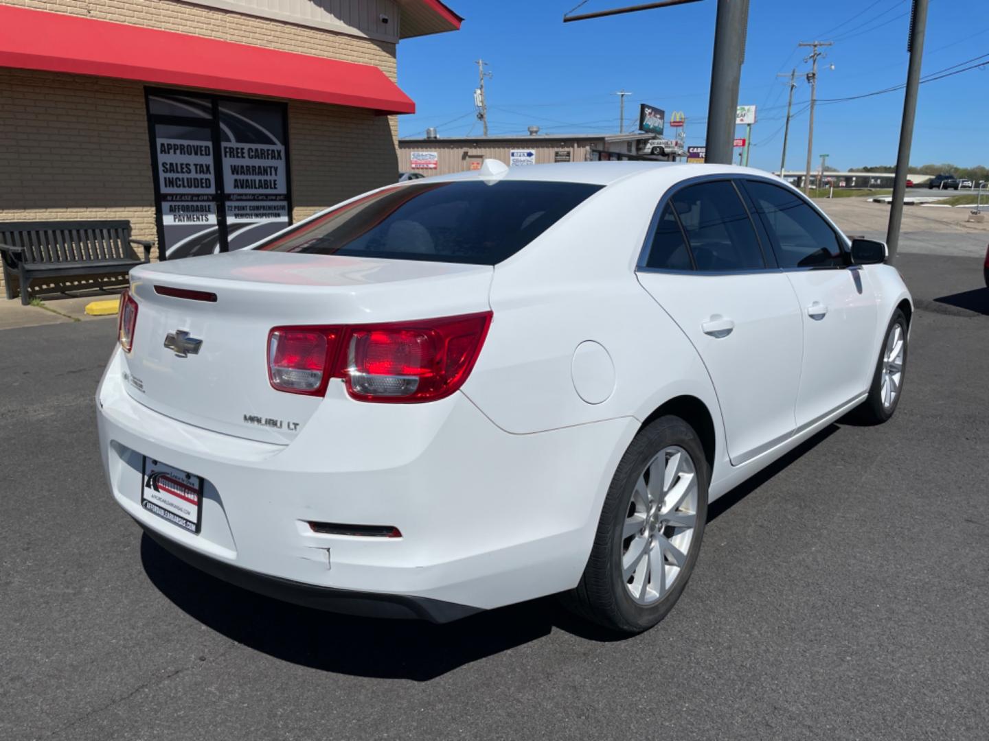 2014 White Chevrolet Malibu (1G11E5SL9EF) with an 4-Cyl, 2.5 Liter engine, Automatic, 6-Spd w/Overdrive and Manual Mode transmission, located at 8008 Warden Rd, Sherwood, AR, 72120, (501) 801-6100, 34.830078, -92.186684 - Photo#7